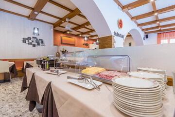 Catering service. Restaurant tables with food at breakfast.