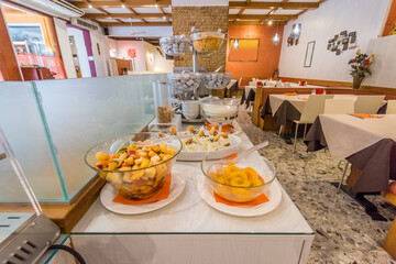 Catering service. Restaurant tables with food at breakfast.