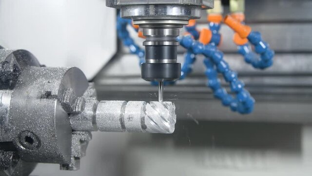 milling cnc machining. cutting tool processing metal detail on milling machine in workshop