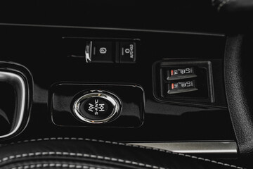 Seat heating and Super All Wheel controller buttons close up view. Car interior. Four-wheel drive...