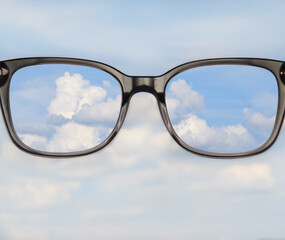 sunglasses on blue sky