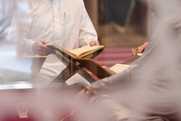muslim people in mosque reading quran together
