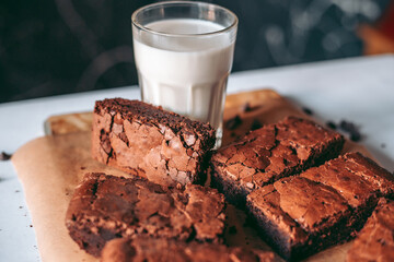 Freshly baked aromatic homemade cakes with a glass of milk