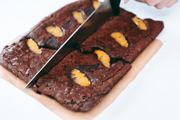 Freshly baked aromatic chocolate brownie with orange