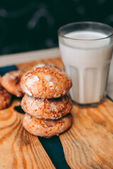 Freshly baked aromatic homemade cakes with a glass of milk