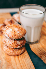 Freshly baked aromatic homemade cakes with a glass of milk