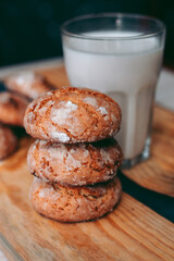 Freshly baked aromatic homemade cakes with a glass of milk