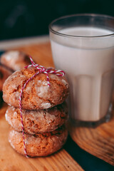 Freshly baked aromatic homemade cakes with a glass of milk