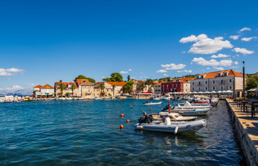 Sutivan, Croatia - August 2020: Locals and tourists enjoying sunny summer day in the small town Sutivan, island Brac, Croatia.