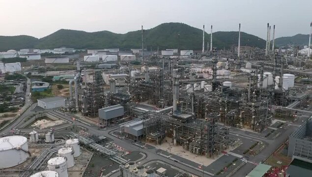 aerial view,Crude oil flows from pipelines to the oil refining plant to produce gasoline, gasohol, E20 diesel fuel to fuel cars and drive the economy within and around the world.