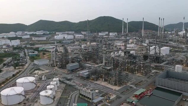 aerial view,Crude oil flows from pipelines to the oil refining plant to produce gasoline, gasohol, E20 diesel fuel to fuel cars and drive the economy within and around the world.