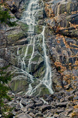 Beautiful Waterfall Vallesinella in Madonna di Campiglio in the autumn time, National Park Adamello-Brenta Italy ,Trentino Dolomite Alps
