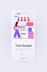 woman buying online in mobile app cpecial offer sale shopping concept full length copy space vertical