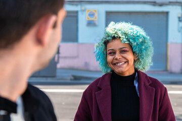young girl smiling avoiding boy's gaze