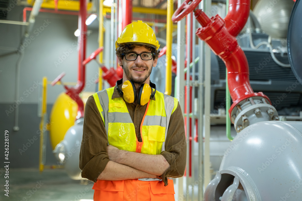 Poster engineer checking and maintenance technical data of system equipment condenser water pump and piping