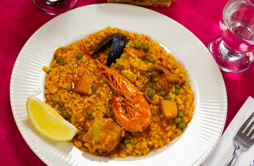 Spanish and Mediterranean dish Paella with seafood shrimp and bivalve cockles