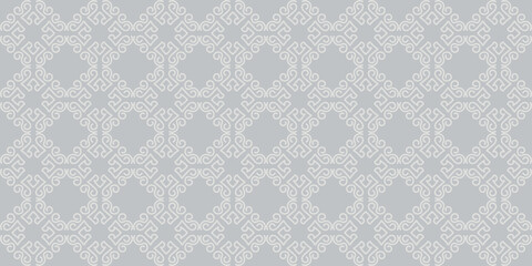 Ethnic background pattern on a silver background. Seamless wallpaper texture for your design