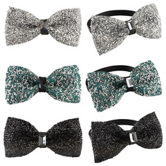 Multicolored bow ties with rhinestones on a white isolate.