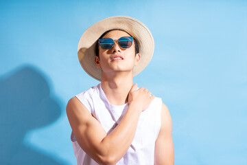 Portrait of handsome asian man wearing sunglasses, Summer vacation concept