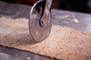 close-up of round shear on dough