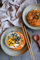 Popular homemade Korean cuisine / Spicy Kimchi Fried Rice / Delicious and appetising meal, great for lunch or dinner