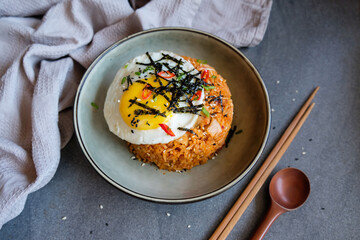 Popular homemade Korean cuisine / Spicy Kimchi Fried Rice / Delicious and appetising meal, great for lunch or dinner