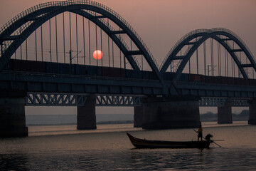 The Godavari Arch Bridge is a bowstring-girder bridge that spans the Godavari River in Rajahmundry, India. It is the latest of the three bridges that span the Godavari river at Rajahmundry. 