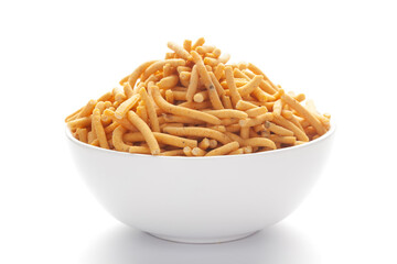 Close up of Marwadi Bhujiya Indian namkeen (snacks) on a ceramic white bowl.