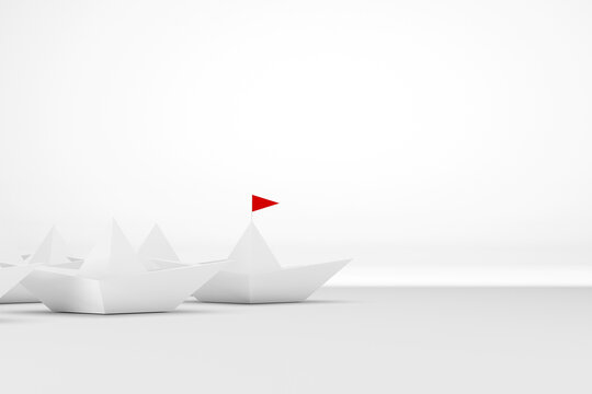 Leadership concept. Paper ship with red flag leading among white on white background. 3d illustration