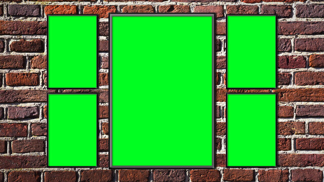 Green screen photo frames on a brick wall - copy space