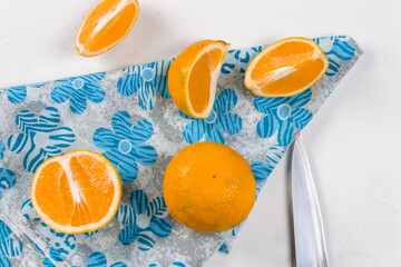 
orange fruit in parts on the table