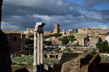 view to the roman forum - temple of Castor and Pollux (Il Tempio dei Dioscuri), Curia Julia - cloudy cityscape - Rome, Italy