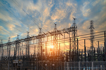 High voltage electric power station,substation with transformers and sky background.high voltage...