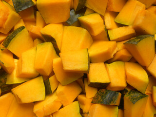 Diced cut yellow color raw fresh Pumpkin
