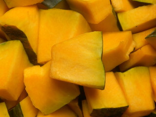 Diced cut yellow color raw fresh Pumpkin