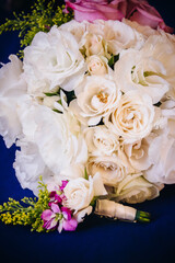 Flowers and a wedding ring