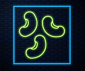 Glowing neon line Beans icon isolated on brick wall background. Vector