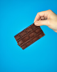 hand with chocolate 