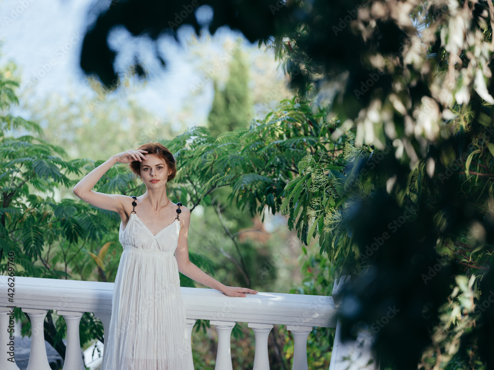 Wall mural woman in white dress on nature greece nature charm travel