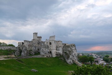 Fototapeta na wymiar Ruins of medieval castle at morning light. It is Ogrodzieniec castle on Eagles Nests trail in the Jura region, Podzamcze, Krakowsko-Czestochowska Upland, Poland