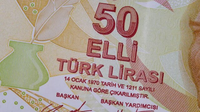 Official currency of Republic of Turkey. Orange 50 Turkish lira. TRY or TL banknote