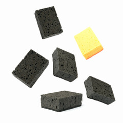 falling kitchen sponges isolated on white. dishwashing sponges fall on the pile