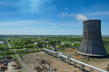 Pavlodar, Kazakhstan - 05.29.2015 : Cooling towers and pipes of various compartments of a large...
