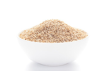 Close up of Organic White Sesame seeds(Sesamum indicum) or white Til with shell inside a white ceramic bowl