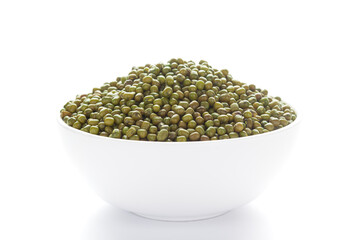 Close-up of Organic green Gram (Vigna radiata) or whole green moong dal inside a ceramic white bowl.