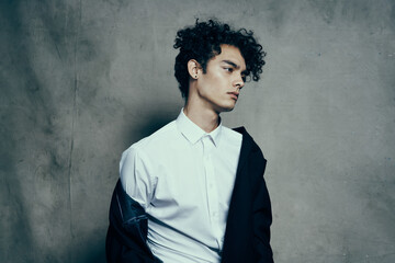 man in white shirt black jacket fashion studio cropped view