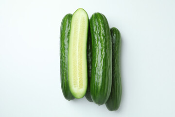 Group of ripe cucumbers on white background