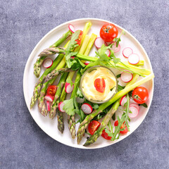 asparagus salad with radish, tomato and sauce