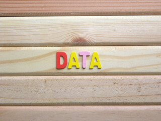 Word Data on wood background