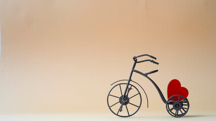 Valentine's Day composition. Decorative bicycle with red heart